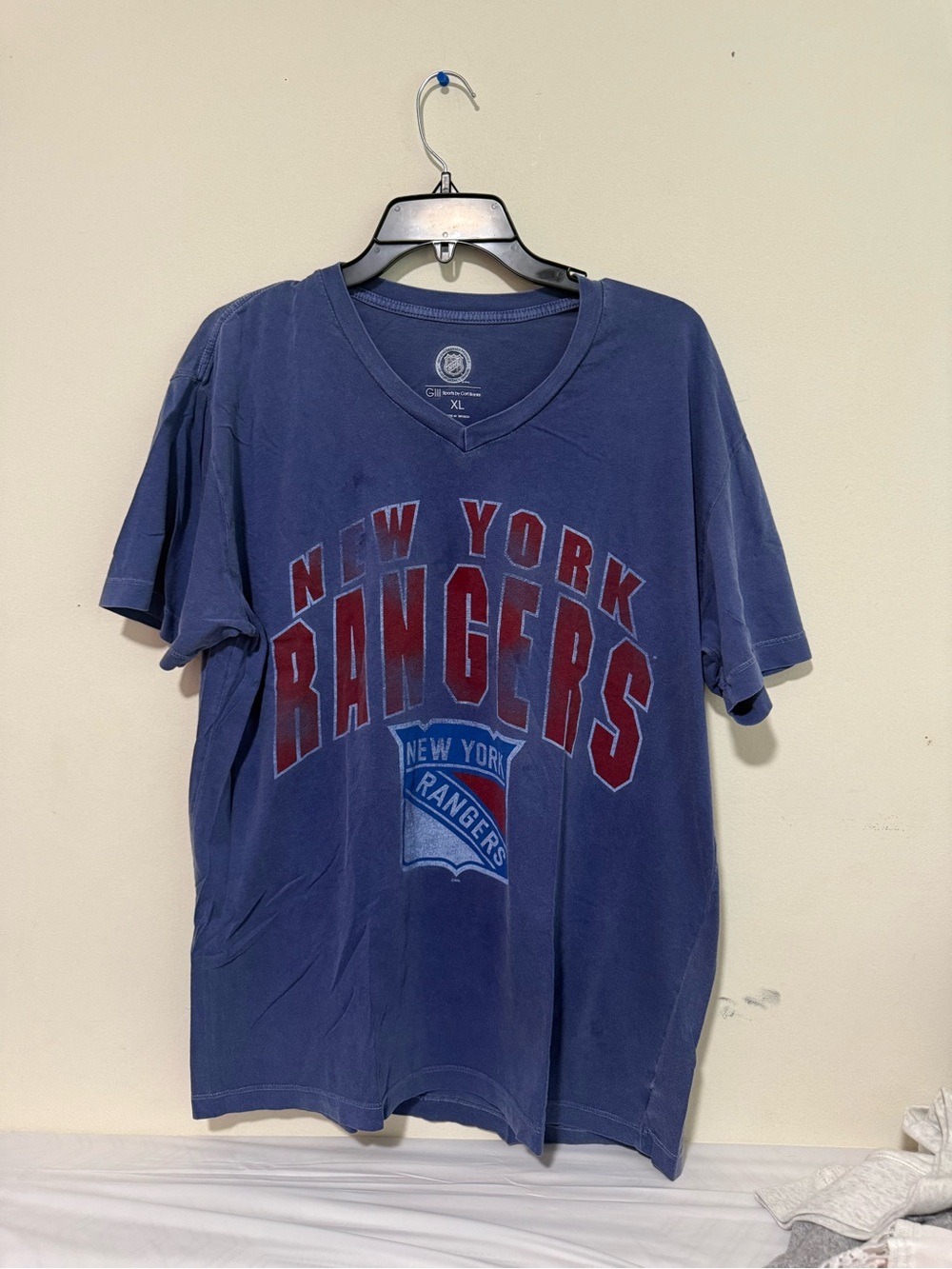 GIII Sports by Carl Banks NHL V-Neck Tee in Heathered Navy with Red Graphics